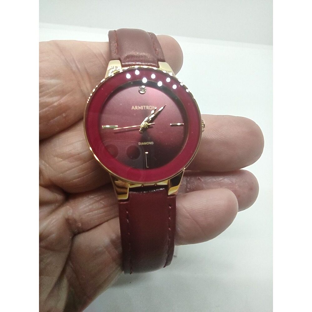 Ladies Armitron red face with diamond 75/5410 GP